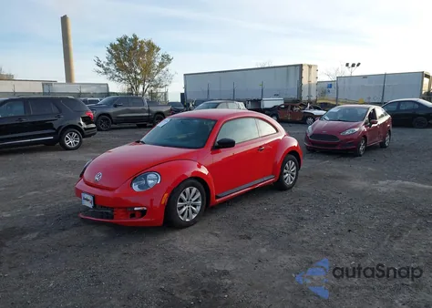 2014 Volkswagen Beetle 1.8T Entry z USA, uszkodzony, nr VIN 3VWF17AT8EM640791